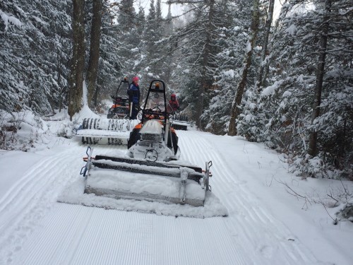 3 of the groomers grooming the snow this morning on River Trail